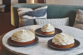 Cedric Grolet cakes sitting on a marbe table